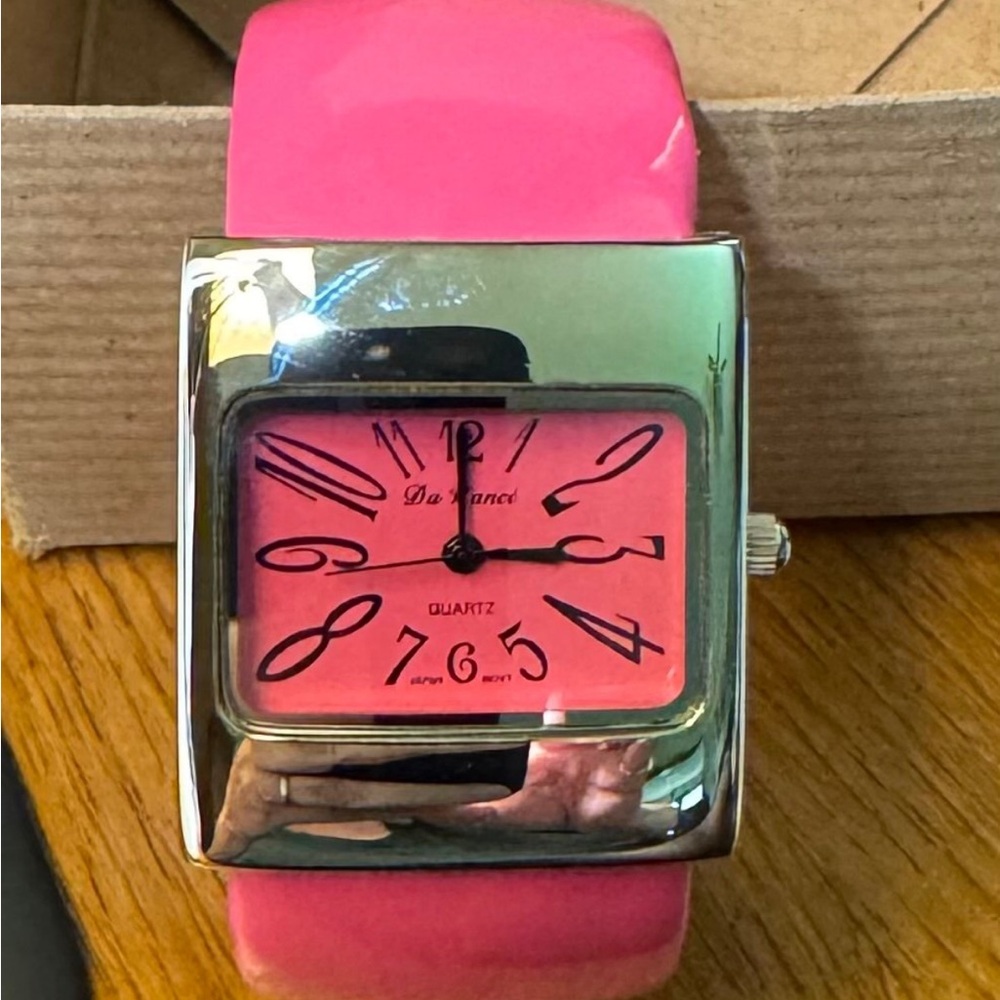 Vintage Da Vanci watch with pink cuff strap.